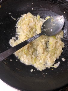 cooking onions with garlic and ginger